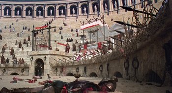 Movie still from “Life of Brian” (1979), directed by Terry Jones – An artistic view of a medieval castle with a lot of decorations; Extreme Wide shot, High angle