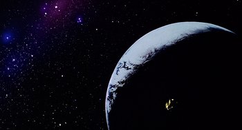 Movie still from “Life of Brian” (1979), directed by Terry Jones – A view of the earth from the space shuttle; Extreme Wide shot, Low angle