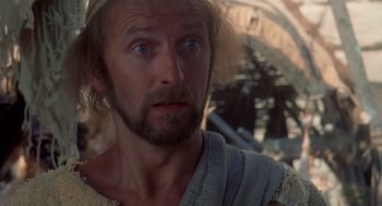 Movie still from “Life of Brian” (1979), directed by Terry Jones – A person with a beard; Close Up shot, Low angle