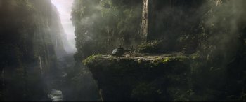 Movie still from “Morbius” (2022), directed by Daniel Espinosa – A helicopter is flying over a cliff in the middle of the day; Extreme Wide shot, Low angle