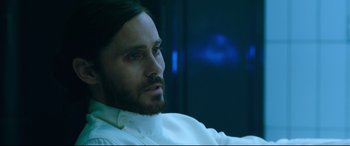 Movie still from “Morbius” (2022), directed by Daniel Espinosa – A person wearing a white shirt; Close Up shot, Over the shoulder angle