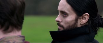 Movie still from “Morbius” (2022), directed by Daniel Espinosa – A person wearing a black jacket; Close Up shot, Over the shoulder angle