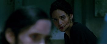 Movie still from “Morbius” (2022), directed by Daniel Espinosa – A person looking at the camera; Close Up shot, Over the shoulder angle