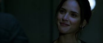 Movie still from “Morbius” (2022), directed by Daniel Espinosa – A person smiling; Close Up shot, Over the shoulder angle