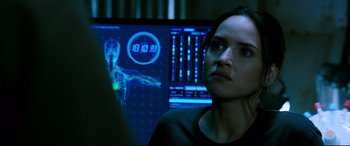 Movie still from “Morbius” (2022), directed by Daniel Espinosa – A woman looking at a computer screen; Close Up shot, Over the shoulder angle