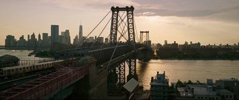 Movie still from “Morbius” (2022), directed by Daniel Espinosa – A view of the williamsburg bridge from a pier; Extreme Wide shot, Low angle