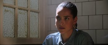 Movie still from “Morbius” (2022), directed by Daniel Espinosa – A person wearing a blue shirt; Close Up shot, Over the shoulder angle