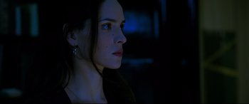 Movie still from “Morbius” (2022), directed by Daniel Espinosa – A beautiful young lady with blue eye shadow; Close Up shot, Low angle