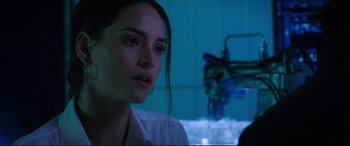 Movie still from “Morbius” (2022), directed by Daniel Espinosa – A person in a dark room; Close Up shot, Over the shoulder angle