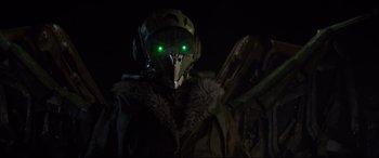 Movie still from “Morbius” (2022), directed by Daniel Espinosa – A person with a green eyes; Close Up shot, Over the shoulder angle