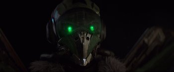 Movie still from “Morbius” (2022), directed by Daniel Espinosa – The eyes of an alien creature with glowing green eyes; Close Up shot, Low angle