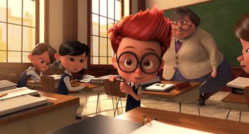 Movie still from “Mr. Peabody & Sherman” (2014), directed by Rob Minkoff – An animated scene of a boy and a girl in a class room; Medium shot, Over the shoulder angle