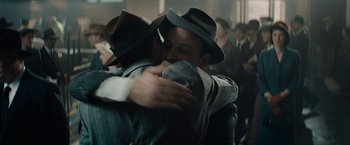 Movie still from “Mudbound” (2017), directed by Dee Rees – A couple of people that are hugging in a room; Close Up shot, Over the shoulder angle
