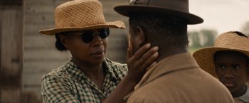 Movie still from “Mudbound” (2017), directed by Dee Rees – A man and a woman are talking to each other; Close Up shot, Over the shoulder angle
