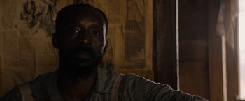 Movie still from “Mudbound” (2017), directed by Dee Rees – A person with a beard; Close Up shot, Over the shoulder angle
