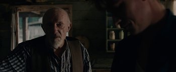 Movie still from “Mudbound” (2017), directed by Dee Rees – An old man with a beard and a mustache; Close Up shot, Over the shoulder angle