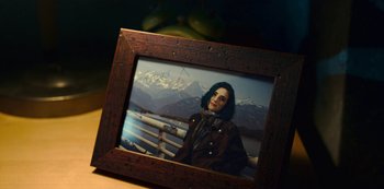 Movie still from “Mute” (2018), directed by Duncan Jones – A picture of a woman in a brown jacket; Extreme Close Up shot, High angle