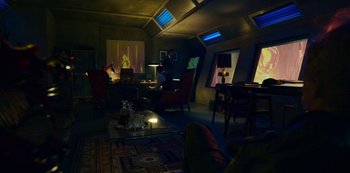 Movie still from “Mute” (2018), directed by Duncan Jones – A living room filled with furniture next to a window; Wide shot, Low angle