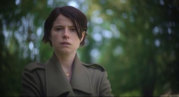 Movie still from “Men” (2022), directed by Alex Garland – A person wearing a jacket; Close Up shot, Low angle