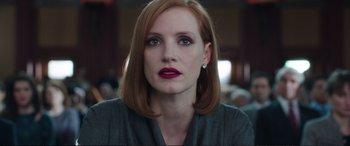 Movie still from “Miss Sloane” (2016), directed by John Madden – A person wearing a gray shirt; Close Up shot, Low angle