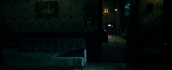 Movie still from “No One Gets Out Alive” (2021), directed by Santiago Menghini – Wide shot, High angle