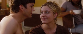 Movie still from “No Strings Attached” (2011), directed by Ivan Reitman – A man and a woman looking at one another; Close Up shot, Over the shoulder angle