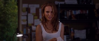 Movie still from “No Strings Attached” (2011), directed by Ivan Reitman – A beautiful young woman with long brown hair; Close Up shot, Over the shoulder angle