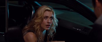 Movie still from “No Strings Attached” (2011), directed by Ivan Reitman – A beautiful blonde woman sitting in a car; Close Up shot, Over the shoulder angle