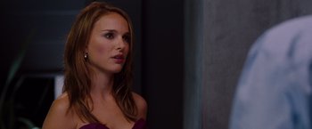 Movie still from “No Strings Attached” (2011), directed by Ivan Reitman – A beautiful young lady looking to her left; Close Up shot, Over the shoulder angle
