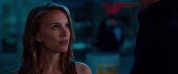 Movie still from “No Strings Attached” (2011), directed by Ivan Reitman – A beautiful young woman looking to her right; Close Up shot, Over the shoulder angle