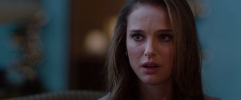 Movie still from “No Strings Attached” (2011), directed by Ivan Reitman – A person with long brown hair; Close Up shot, Over the shoulder angle