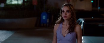 Movie still from “No Strings Attached” (2011), directed by Ivan Reitman – A beautiful young lady wearing a blue dress; Close Up shot, Over the shoulder angle