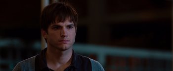 Movie still from “No Strings Attached” (2011), directed by Ivan Reitman – A person wearing a shirt; Close Up shot, Over the shoulder angle