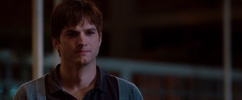 Movie still from “No Strings Attached” (2011), directed by Ivan Reitman – A person wearing a black shirt; Close Up shot, Over the shoulder angle
