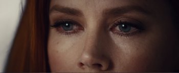 Movie still from “Nocturnal Animals” (2016), directed by Tom Ford – A woman's eyes with blue eyes; Extreme Close Up shot, Overhead angle