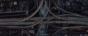 Movie still from “Nocturnal Animals” (2016), directed by Tom Ford – An aerial view of a bunch of intersecting roads; Extreme Wide shot, Overhead angle