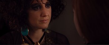 Movie still from “Nocturnal Animals” (2016), directed by Tom Ford – A person wearing a neck tie looking at a mirror; Close Up shot, Over the shoulder angle