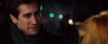 Movie still from “Nocturnal Animals” (2016), directed by Tom Ford – A person wearing a jacket; Close Up shot, Over the shoulder angle