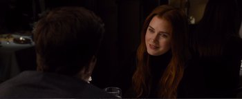 Movie still from “Nocturnal Animals” (2016), directed by Tom Ford – A woman sitting in front of a man at a table; Close Up shot, Over the shoulder angle