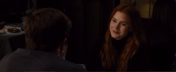 Movie still from “Nocturnal Animals” (2016), directed by Tom Ford – A young woman sitting in front of a mirror; Close Up shot, Over the shoulder angle