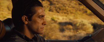 Movie still from “Nocturnal Animals” (2016), directed by Tom Ford – A person looking out of a car window; Close Up shot, Over the shoulder angle