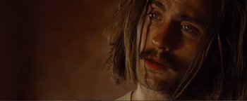 Movie still from “Nocturnal Animals” (2016), directed by Tom Ford – A person with long hair; Close Up shot, Over the shoulder angle