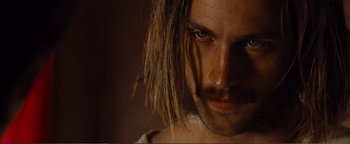 Movie still from “Nocturnal Animals” (2016), directed by Tom Ford – A person with long hair; Close Up shot, Over the shoulder angle