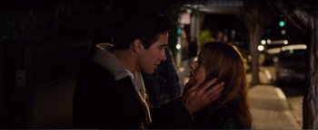 Movie still from “Nocturnal Animals” (2016), directed by Tom Ford – A man and a woman looking at one another; Close Up shot, Over the shoulder angle