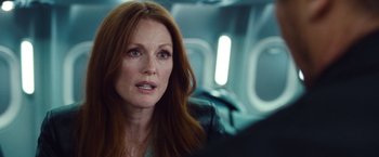 Movie still from “Non-Stop” (2014), directed by Jaume Collet-Serra – Julianne moore in a scene from the movie maps to the stars; Close Up shot, Over the shoulder angle