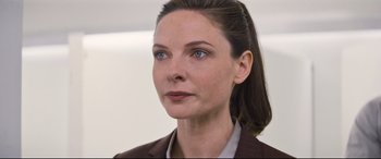 Movie still from “Mission: Impossible - Fallout” (2018), directed by Christopher McQuarrie – A person wearing a suit and tie; Close Up shot, Over the shoulder angle