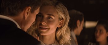 Movie still from “Mission: Impossible - Fallout” (2018), directed by Christopher McQuarrie – A person with blonde curly hair; Close Up shot, Over the shoulder angle