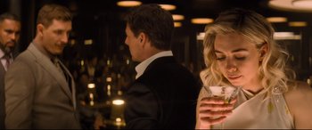 Movie still from “Mission: Impossible - Fallout” (2018), directed by Christopher McQuarrie – A man and a woman are standing in front of a bar; Close Up shot, Over the shoulder angle