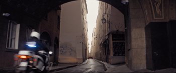 Movie still from “Mission: Impossible - Fallout” (2018), directed by Christopher McQuarrie – An alley way between two tall buildings in a city; Extreme Wide shot, High angle