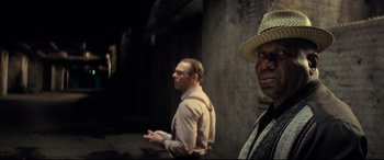 Movie still from “Mission: Impossible - Fallout” (2018), directed by Christopher McQuarrie – Two men standing next to each other in a room; Close Up shot, Over the shoulder angle